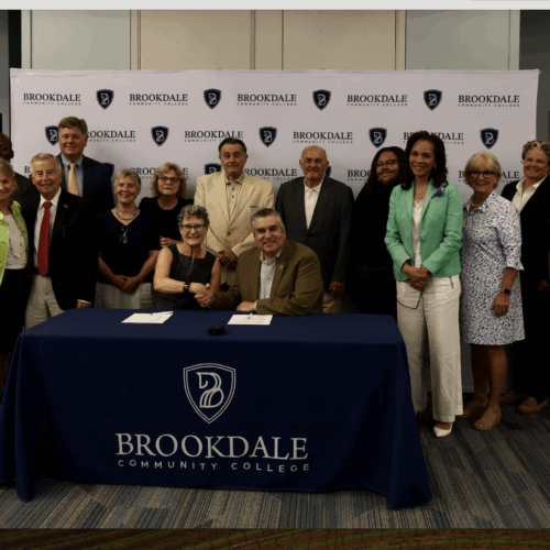 Brookdale Community College and Parker Family Health Center Open Door to NJ’s First Free Community Dental Clinic. Photo of Board of Trustees and Dr. David Stout and Suzy Dyer.